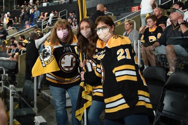 Fan banner captains representing nurses of New England pose for a photo before there game of the Boston Bruins against the New York Islanders in Game...