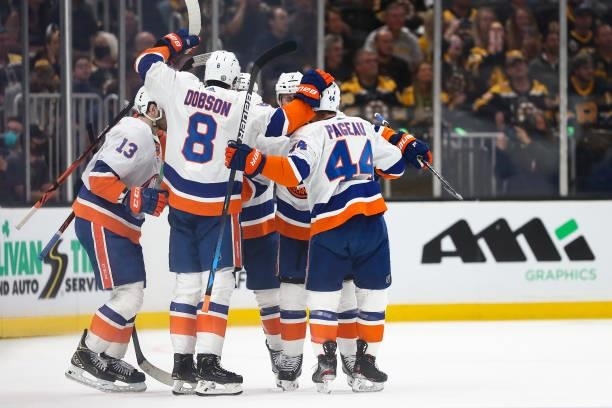 Mathew Barzal of the New York Islanders celebrates with teammates after scoring in the first period in Game Five of the Second Round of the 2021...