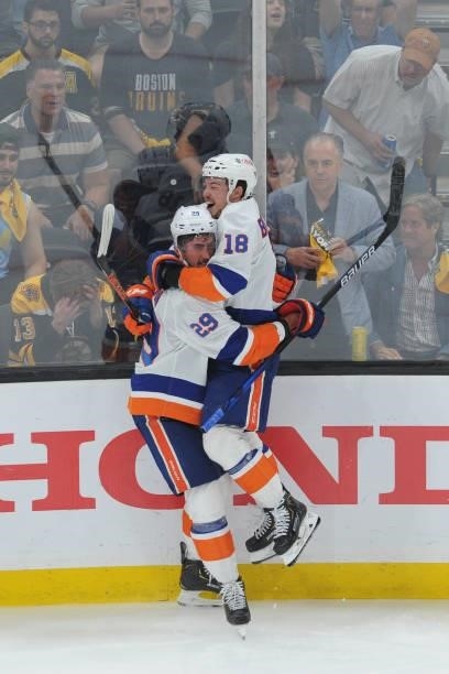 Brock Nelson and Anthony Beauvillier of the New York Islanders react to the third period goal against the Boston Bruins in Game Five of the Second...