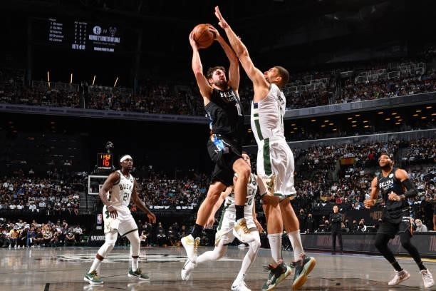 Joe Harris of the Brooklyn Nets shoots the ball against the Milwaukee Bucks during Round 2, Game 2 on June 7, 2021 at Barclays Center in Brooklyn,...