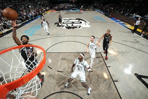 Kyrie Irving of the Brooklyn Nets shoots the ball against the Milwaukee Bucks during Round 2, Game 2 of the 2021 NBA Playoffs on June 7, 2021 at...