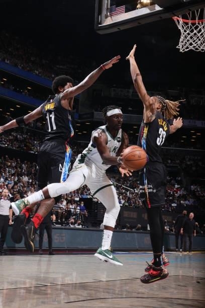 Jrue Holiday of the Milwaukee Bucks passes the ball against the Brooklyn Nets during Round 2, Game 2 of the 2021 NBA Playoffs on June 7, 2021 at...