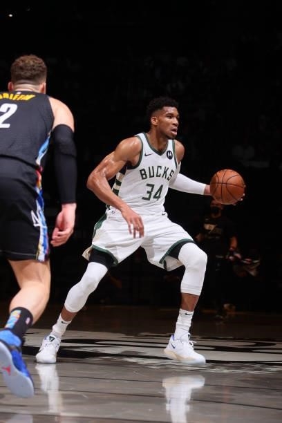 Giannis Antetokounmpo of the Milwaukee Bucks handles the ball against the Brooklyn Nets during Round 2, Game 2 of the 2021 NBA Playoffs on June 7,...