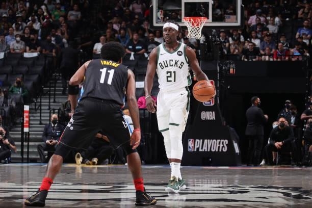 Jrue Holiday of the Milwaukee Bucks dribbles the ball against the Brooklyn Nets during Round 2, Game 2 of the 2021 NBA Playoffs on June 7, 2021 at...