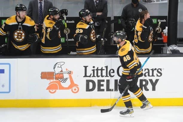 David Krejci of the Boston Bruins celebrates his third period goal against the New York Islanders in Game Five of the Second Round of the 2021...