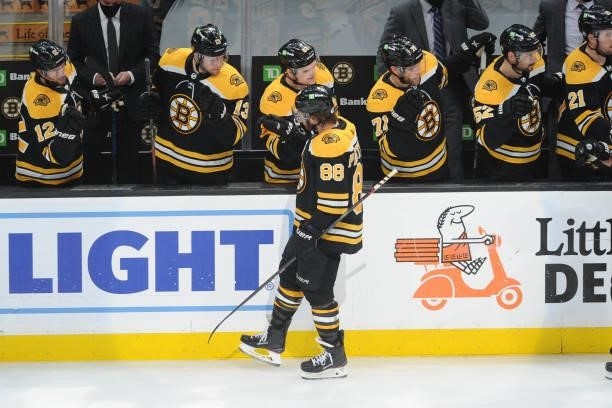 David Pastrnak of the Boston Bruins celebrates his third period goal against the New York Islanders in Game Five of the Second Round of the 2021...
