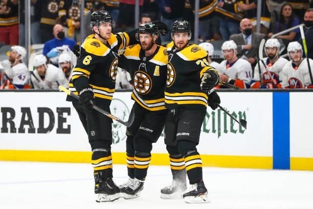 David Krejci of the Boston Bruins celebrates with teammates after scoring in the third period in Game Five of the Second Round of the 2021 Stanley...