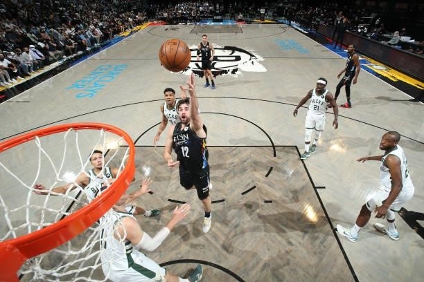Joe Harris of the Brooklyn Nets shoots the ball against the Milwaukee Bucks during Round 2, Game 2 of the 2021 NBA Playoffs on June 7, 2021 at...