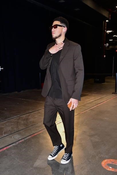 Devin Booker of the Phoenix Suns arrives to the arena before the game against the Denver Nuggets during Round 2, Game 1 of the 2021 NBA Playoffs on...