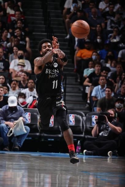 Kyrie Irving of the Brooklyn Nets passes the ball against the Milwaukee Bucks during Round 2, Game 2 of the 2021 NBA Playoffs on June 7, 2021 at...