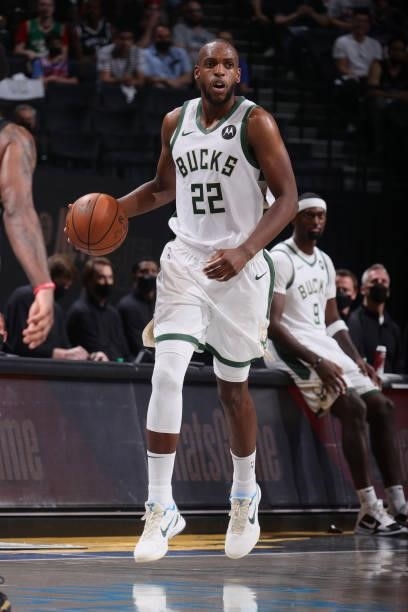 Khris Middleton of the Milwaukee Bucks dribbles the ball against the Brooklyn Nets during Round 2, Game 2 of the 2021 NBA Playoffs on June 7, 2021 at...