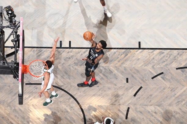 Kyrie Irving of the Brooklyn Nets shoots the ball against the Milwaukee Bucks during Round 2, Game 2 of the 2021 NBA Playoffs on June 7, 2021 at...
