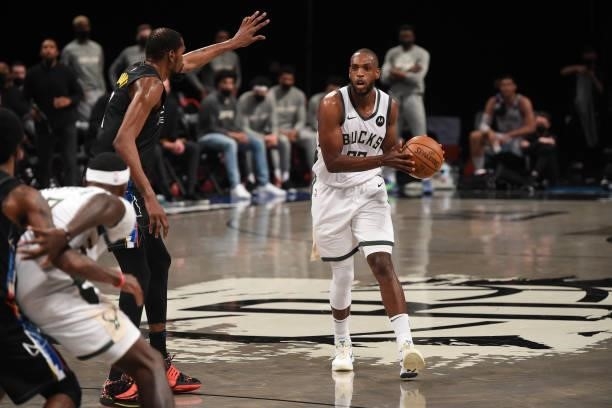Khris Middleton of the Milwaukee Bucks handles the ball against the Brooklyn Nets during Round 2, Game 2 on June 7, 2021 at Barclays Center in...