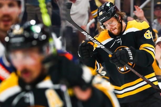 David Pastrnak of the Boston Bruins react after scoring in the third period in Game Five of the Second Round of the 2021 Stanley Cup Playoffs against...