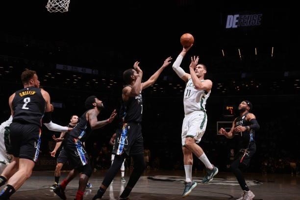 Brook Lopez of the Milwaukee Bucks shoots the ball against the Brooklyn Nets during Round 2, Game 2 of the 2021 NBA Playoffs on June 7, 2021 at...