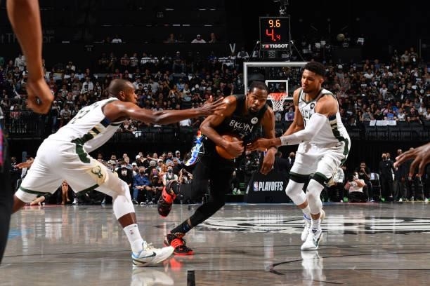 Kevin Durant of the Brooklyn Nets drives to the basket against Giannis Antetokounmpo of the Milwaukee Bucks during Round 2, Game 2 on June 7, 2021 at...