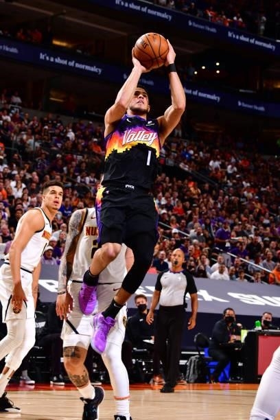 Devin Booker of the Phoenix Suns drives to the basket against the Denver Nuggets during Round 2, Game 1 of the 2021 NBA Playoffs on June 7, 2021 at...