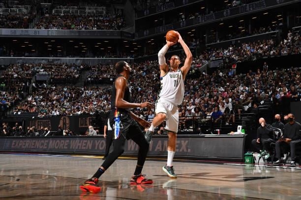Brook Lopez of the Milwaukee Bucks shoots the ball against the Brooklyn Nets during Round 2, Game 2 on June 7, 2021 at Barclays Center in Brooklyn,...