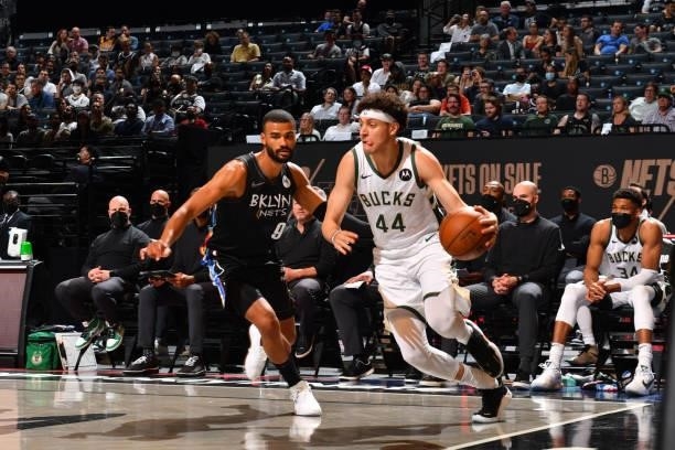 Justin Jackson of the Milwaukee Bucks handles the ball against the Brooklyn Nets during Round 2, Game 2 on June 7, 2021 at Barclays Center in...