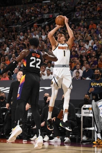 Michael Porter Jr. #1 of the Denver Nuggets shoots a three point basket during the game against the Phoenix Suns during Round 2, Game 1 of the 2021...