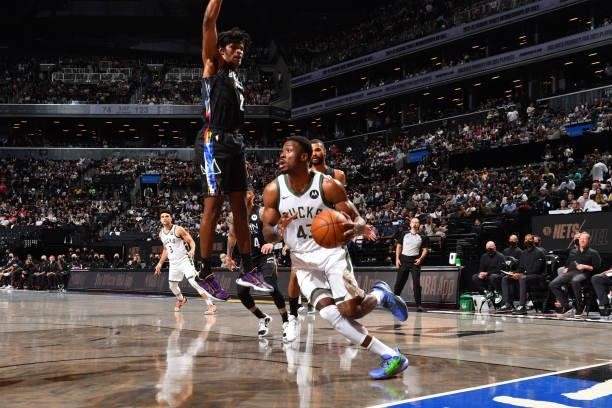 Thanasis Antetokounmpo of the Milwaukee Bucks handles the ball against the Brooklyn Nets during Round 2, Game 2 on June 7, 2021 at Barclays Center in...