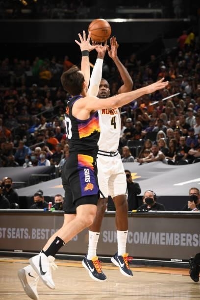 Paul Millsap of the Denver Nuggets shoots the ball against the Phoenix Suns during Round 2, Game 1 of the 2021 NBA Playoffs on June 7, 2021 at...