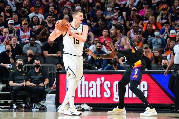 Nikola Jokic of the Denver Nuggets handles the ball during the game against the Phoenix Suns during Round 2, Game 1 of the 2021 NBA Playoffs on June...