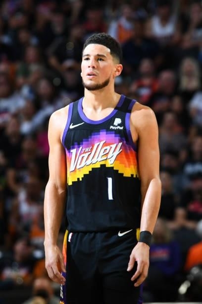 Devin Booker of the Phoenix Suns looks on during the game against the Denver Nuggets during Round 2, Game 1 of the 2021 NBA Playoffs on June 7, 2021...