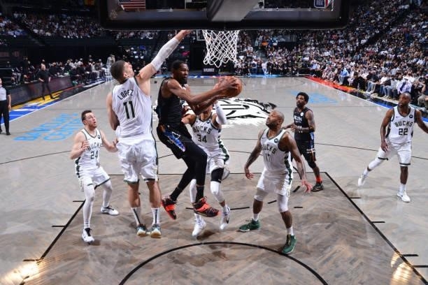 Kevin Durant of the Brooklyn Nets shoots th eball against the Milwaukee Bucks during Round 2, Game 2 on June 7, 2021 at Barclays Center in Brooklyn,...