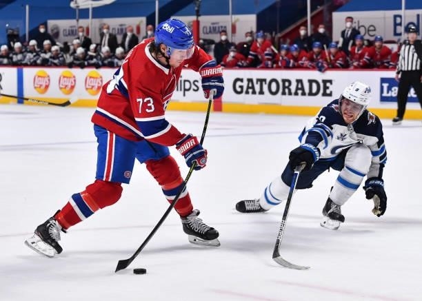 Andrew Copp of the Winnipeg Jets attempts to block a shot by Tyler Toffoli of the Montreal Canadiens during the second period in Game Four of the...