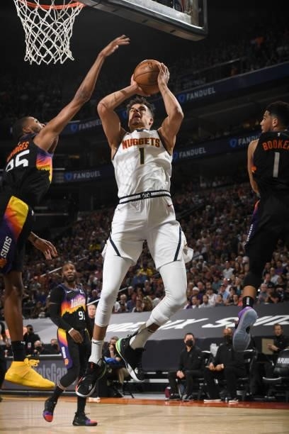 Michael Porter Jr. #1 of the Denver Nuggets drives to the basket during the game against the Phoenix Suns during Round 2, Game 1 of the 2021 NBA...