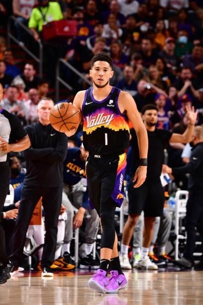 Devin Booker of the Phoenix Suns dribbles the ball against the Denver Nuggets during Round 2, Game 1 of the 2021 NBA Playoffs on June 7, 2021 at...