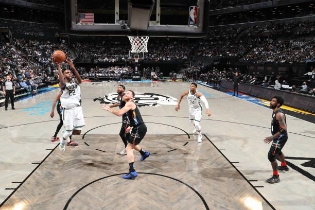 Khris Middleton of the Milwaukee Bucks drives to the basket against the Brooklyn Nets during Round 2, Game 2 of the 2021 NBA Playoffs on June 7, 2021...