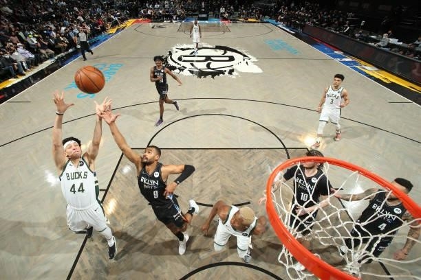 Justin Jackson of the Milwaukee Bucks rebounds the ball against the Brooklyn Nets during Round 2, Game 2 of the 2021 NBA Playoffs on June 7, 2021 at...
