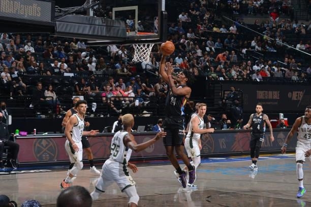 Alize Johnson of the Brooklyn Nets shoots the ball against the Milwaukee Bucks during Round 2, Game 2 on June 7, 2021 at Barclays Center in Brooklyn,...