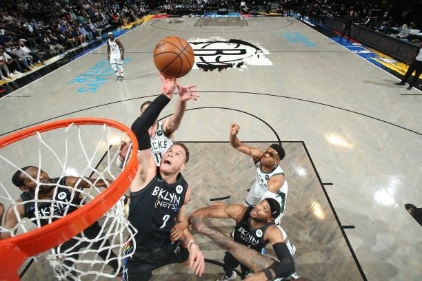 Blake Griffin of the Brooklyn Nets rebounds the ball against the Milwaukee Bucks during Round 2, Game 2 of the 2021 NBA Playoffs on June 7, 2021 at...