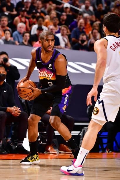 Chris Paul of the Phoenix Suns looks to shoots the ball against the Denver Nuggets during Round 2, Game 1 of the 2021 NBA Playoffs on June 7, 2021 at...