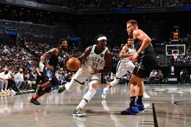 Jrue Holiday of the Milwaukee Bucks handles the ball against the Brooklyn Nets during Round 2, Game 2 on June 7, 2021 at Barclays Center in Brooklyn,...