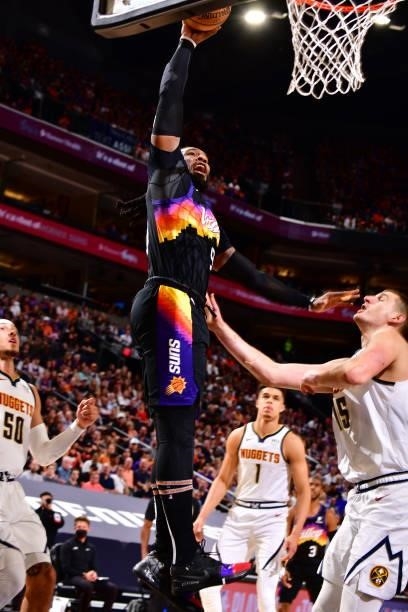 Jae Crowder of the Phoenix Suns dunks the ball against the Denver Nuggets during Round 2, Game 1 of the 2021 NBA Playoffs on June 7, 2021 at Phoenix...