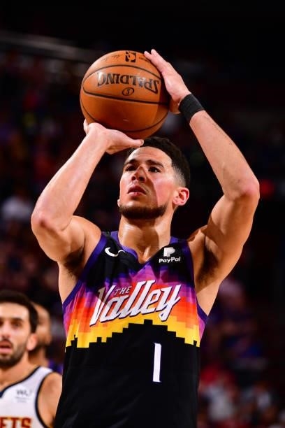 Devin Booker of the Phoenix Suns shoots a free throw against the Denver Nuggets during Round 2, Game 1 of the 2021 NBA Playoffs on June 7, 2021 at...