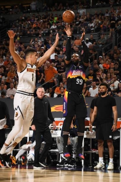 Jae Crowder of the Phoenix Suns shoots a three point basket against the Denver Nuggets during Round 2, Game 1 of the 2021 NBA Playoffs on June 7,...