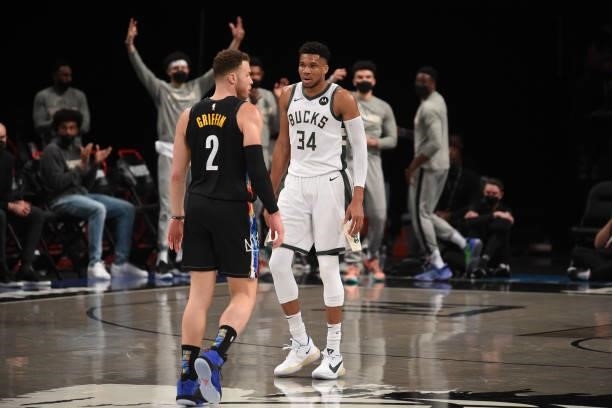 Blake Griffin of the Brooklyn Nets and Giannis Antetokounmpo of the Milwaukee Bucks look on during a game during Round 2, Game 2 on June 7, 2021 at...