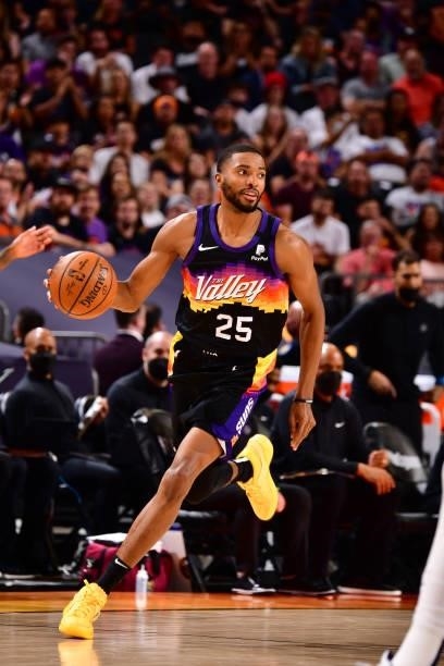 Mikal Bridges of the Phoenix Suns dribbles the ball against the Denver Nuggets during Round 2, Game 1 of the 2021 NBA Playoffs on June 7, 2021 at...