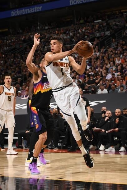 Michael Porter Jr. #1 of the Denver Nuggets handles the ball during Round 2, Game 1 of the 2021 NBA Playoffs on June 7, 2021 at Phoenix Suns Arena in...
