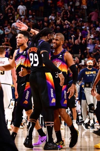 Jae Crowder and Chris Paul of the Phoenix Suns hug during Round 2, Game 1 of the 2021 NBA Playoffs on June 7, 2021 at Phoenix Suns Arena in Phoenix,...
