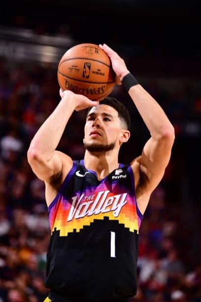 Devin Booker of the Phoenix Suns shoots a free throw against the Denver Nuggets during Round 2, Game 1 of the 2021 NBA Playoffs on June 7, 2021 at...