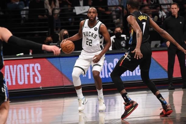 Khris Middleton of the Milwaukee Bucks handles the ball against the Brooklyn Nets during Round 2, Game 2 on June 7, 2021 at Barclays Center in...