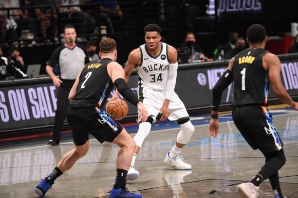 Giannis Antetokounmpo of the Milwaukee Bucks handles the ball against the Brooklyn Nets during Round 2, Game 2 on June 7, 2021 at Barclays Center in...