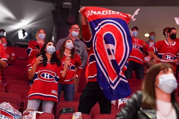 Fans take in the atmosphere following the Canadiens 3-2 overtime victory against the Winnipeg Jets to close out the series in Game Four of the Second...