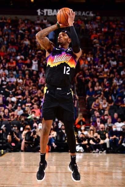Torrey Craig of the Phoenix Suns shoots a three point basket against the Denver Nuggets during Round 2, Game 1 of the 2021 NBA Playoffs on June 7,...